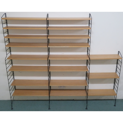 2107 - A MID 20TH CENTURY SWEDISH NISSE STRINNING, STRING MODULAR SHELVING SYSTEM comprising three ste... 