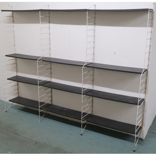 2110 - A MID 20TH CENTURY SWEDISH NISSE STRINNING, STRING MODULAR SHELVING SYSTEM comprising four step... 