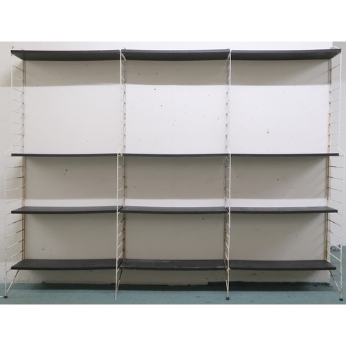 2110 - A MID 20TH CENTURY SWEDISH NISSE STRINNING, STRING MODULAR SHELVING SYSTEM comprising four step... 