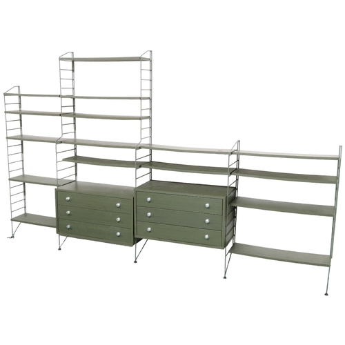 2111 - A MID 20TH CENTURY SWEDISH NISSE STRINNING, STRING MODULAR SHELVING SYSTEM comprising two stepp... 