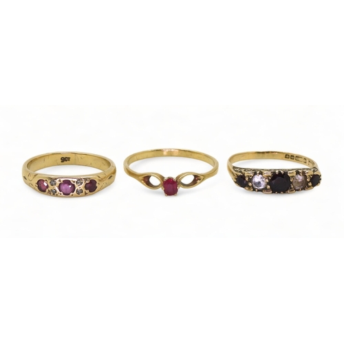 749 - A 9ct gold ruby and diamond accent ring, size P, a 9ct garnet and clear gem ring size P1/2, and a fu... 