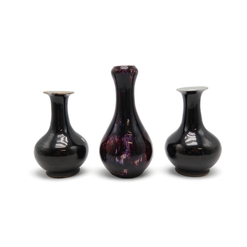 2390 - A CHINESE MOTTLED GLAZED BOTTLE SHAPED VASEwith garlic neck, 15cm high and matched pair of monochrom... 