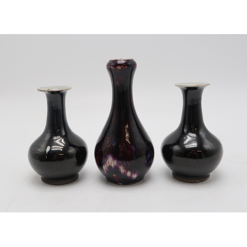 2390 - A CHINESE MOTTLED GLAZED BOTTLE SHAPED VASEwith garlic neck, 15cm high and matched pair of monochrom... 