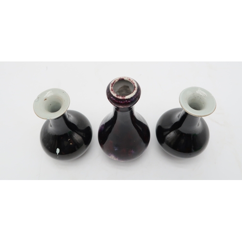 2390 - A CHINESE MOTTLED GLAZED BOTTLE SHAPED VASEwith garlic neck, 15cm high and matched pair of monochrom... 