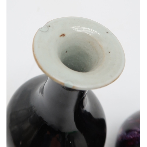 2390 - A CHINESE MOTTLED GLAZED BOTTLE SHAPED VASEwith garlic neck, 15cm high and matched pair of monochrom... 