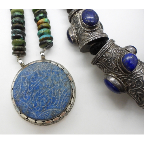 2782 - A COLLECTION OF WHITE METAL TRIBAL JEWELLERY from Afghanistan, to include a statement necklace, embo... 