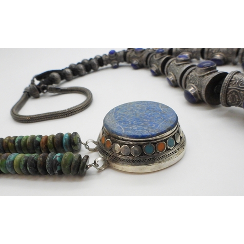 2782 - A COLLECTION OF WHITE METAL TRIBAL JEWELLERY from Afghanistan, to include a statement necklace, embo... 