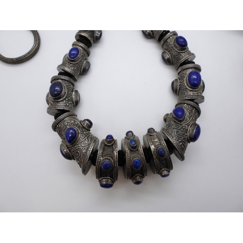 2782 - A COLLECTION OF WHITE METAL TRIBAL JEWELLERY from Afghanistan, to include a statement necklace, embo... 