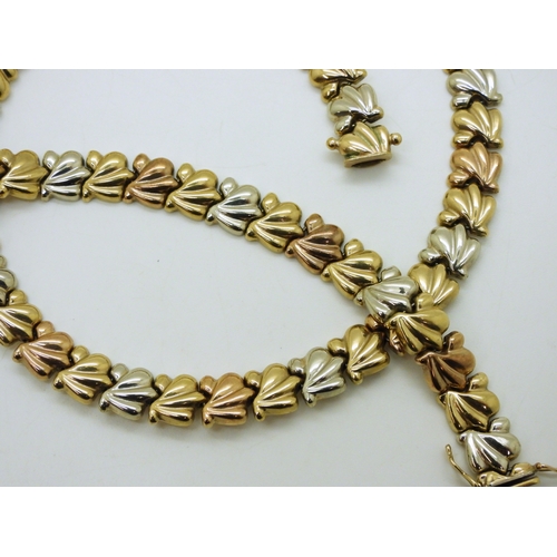 2783 - A 9CT GOLD TRICOLOUR LEAF PATTERN SUITEcomprising of a necklace 43.5cm, and a matching bracelet leng... 