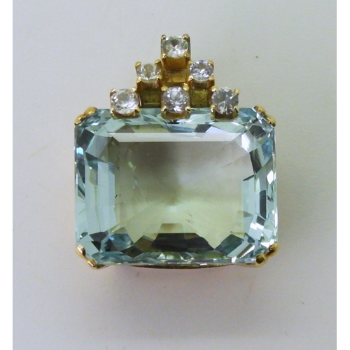 2790 - AQUAMARINE PENDANTset in 14k gold and further set with sparkling white sapphires. Aquamarine approx ... 