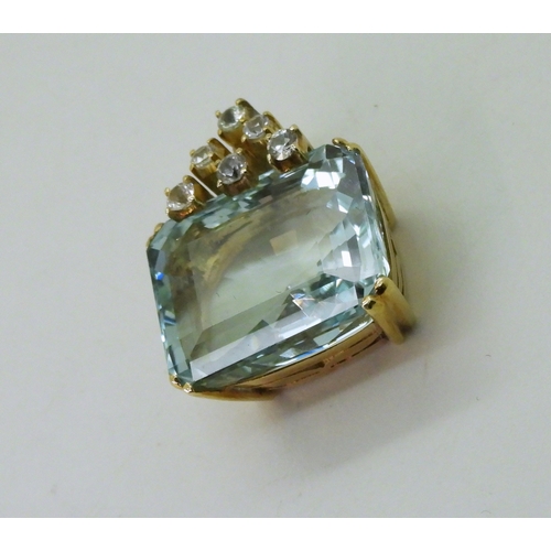 2790 - AQUAMARINE PENDANTset in 14k gold and further set with sparkling white sapphires. Aquamarine approx ... 