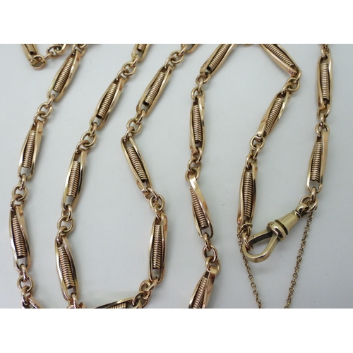 2794 - A 9CT ROSE GOLD GUARD CHAINwith decorative twist links, stamped 9c to the clasp and full 1990 Birmin... 