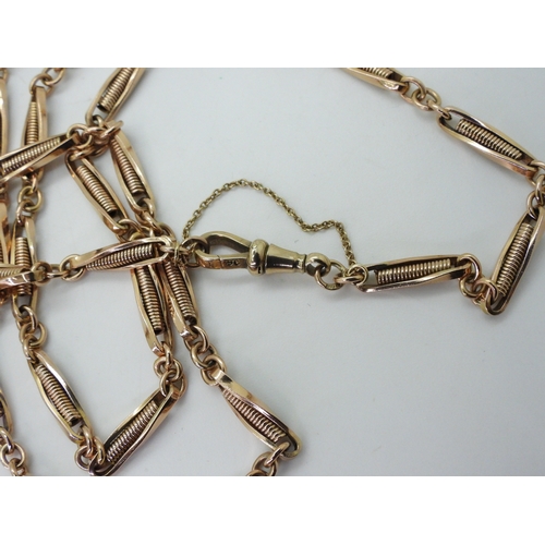 2794 - A 9CT ROSE GOLD GUARD CHAINwith decorative twist links, stamped 9c to the clasp and full 1990 Birmin... 