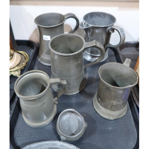 104 - A collection of pewter tankards, two plates and a bowl etc