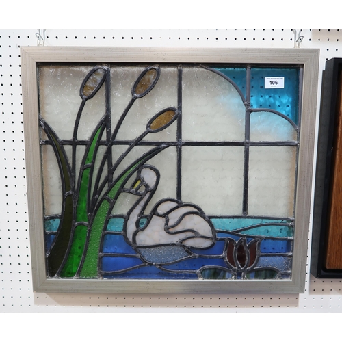 106 - A framed stained glass panel depicting a swan and bullrushes