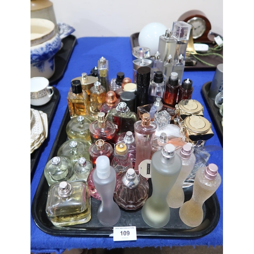 109 - A collection of ladies perfumes some testers including Jimmy Choo, DKNY, Armani, Burberry, Dior and ... 