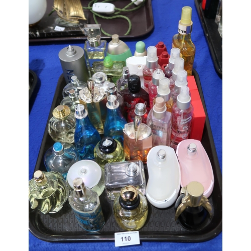 110 - A collection of perfumes, some testers including Nina Ricci, YSL, Paco Rabanne, Cacharel, Coty, Mugl... 