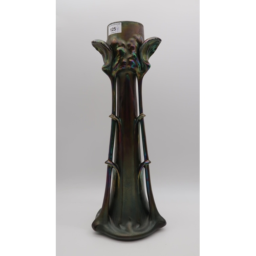 125 - An Art Nouveau pottery vase with iridescent glaze, a Thomas Forester & Son Trogon Ware vase... 