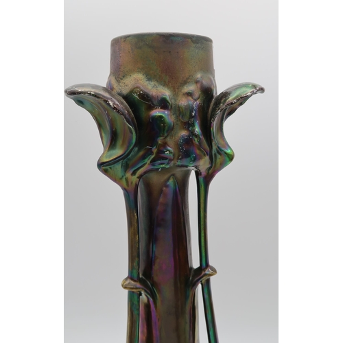 125 - An Art Nouveau pottery vase with iridescent glaze, a Thomas Forester & Son Trogon Ware vase... 