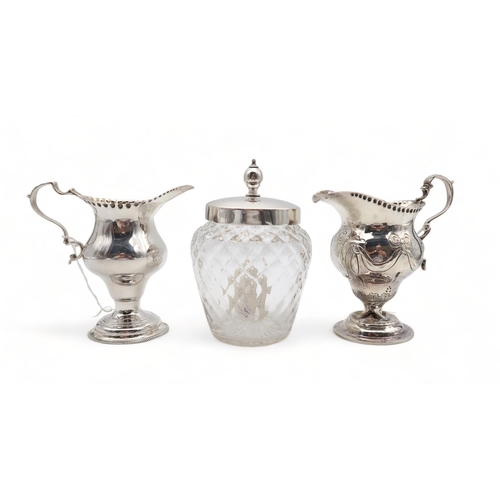 203 - A late-Victorian silver cream jug, by George Nathan & Ridley Hayes, Chester 1895, of baluster fo... 