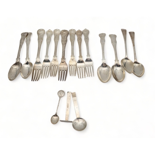 218 - A collection of silver cutlery including late-Victorian fiddle, thread and shell pattern forks, vari... 