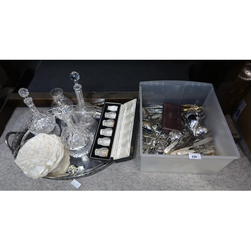 220 - A collection of EPNS including mother of pearl handled cutlery, cut glass decanters and dishes, tray... 