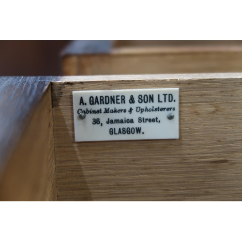 27 - A 20th century oak Jacobean style two drawer buffet table on turned supports joined by stretchers, 8... 