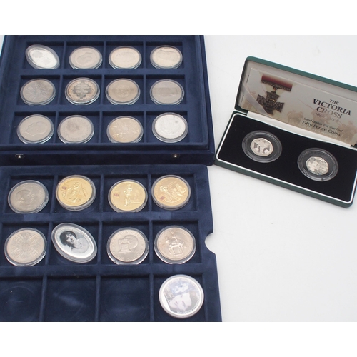 223 - A lot comprising a commemorative Morgan Dollar, Elizabeth II crowns and The Victoria Cross 1856-2006... 