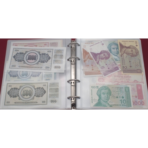 243 - A collection of worldwide bank notes with Eastern Bloc and Asian continent examples