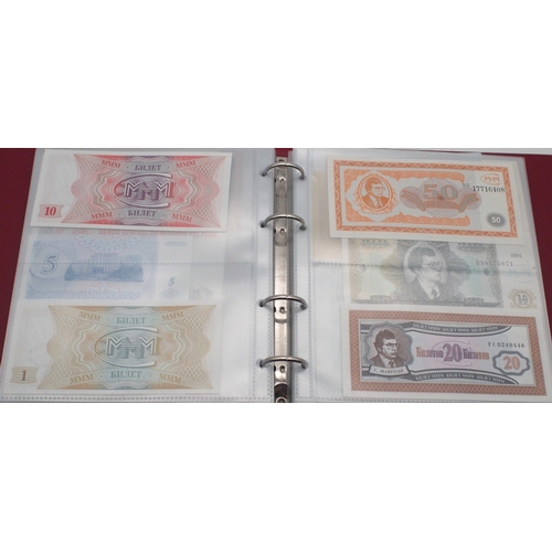 243 - A collection of worldwide bank notes with Eastern Bloc and Asian continent examples