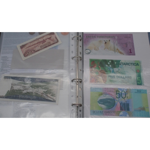 244 - A collection of worldwide banknotes with examples from North Korea, Iraq, Syria, The Islamic Republi... 