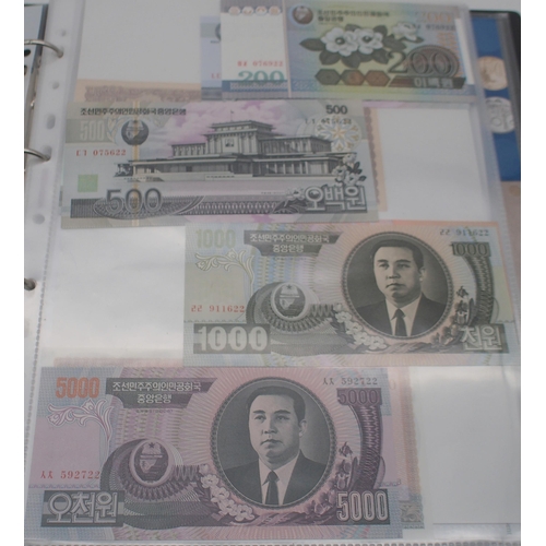 244 - A collection of worldwide banknotes with examples from North Korea, Iraq, Syria, The Islamic Republi... 