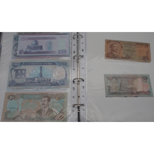 244 - A collection of worldwide banknotes with examples from North Korea, Iraq, Syria, The Islamic Republi... 