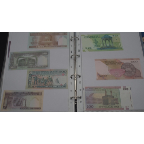 244 - A collection of worldwide banknotes with examples from North Korea, Iraq, Syria, The Islamic Republi... 