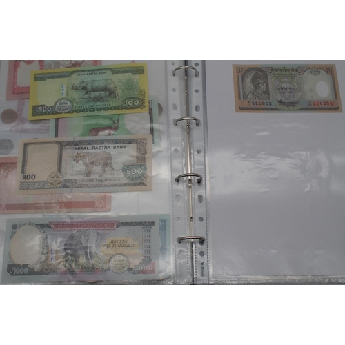 244 - A collection of worldwide banknotes with examples from North Korea, Iraq, Syria, The Islamic Republi... 