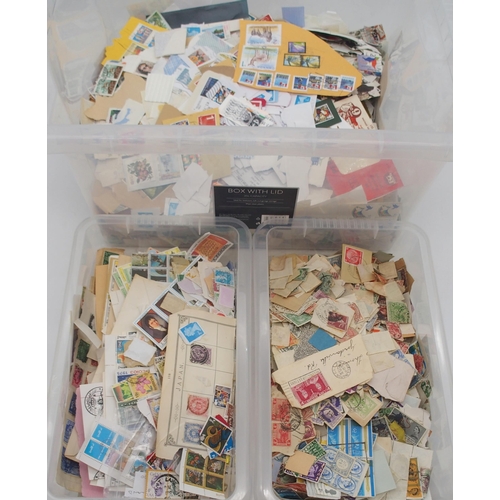 256 - A quantity of loose worldwide stamps and cut outs