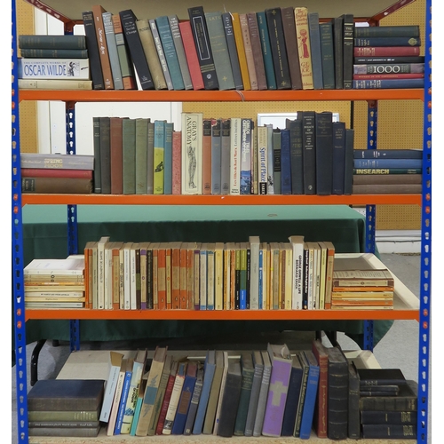 326 - Four shelves of assorted books, to include academic and theological titles, alongside paperback Peng... 