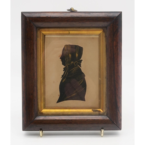 330 - A 19th century silhouette portrait miniature of a lady in profile, housed in a rosewood frame, toget... 