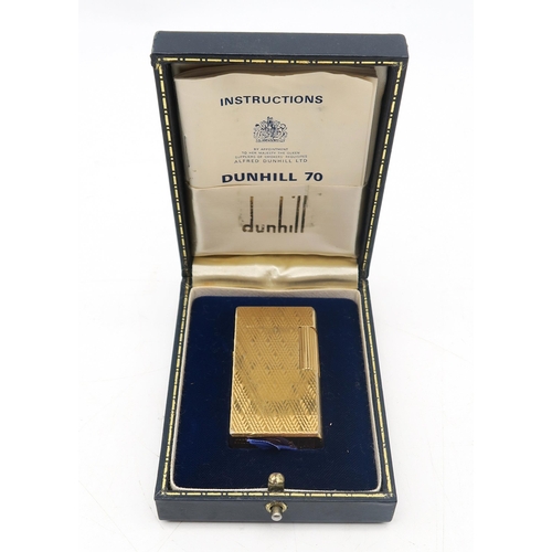 331A - A vintage Dunhill 70 gold-plated cigarette lighter, no. M813, housed in its original fitted case&nbs... 