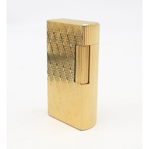 331A - A vintage Dunhill 70 gold-plated cigarette lighter, no. M813, housed in its original fitted case&nbs... 