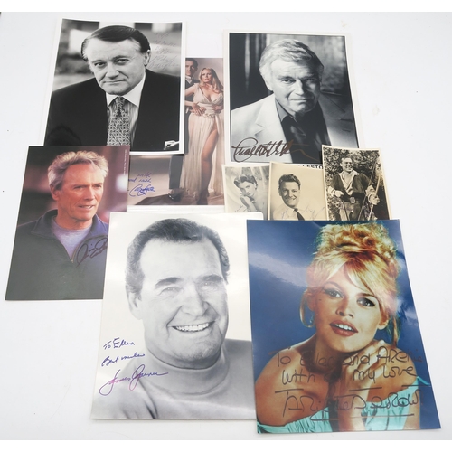 338 - AUTOGRAPHSA large collection of signed photographs of Hollywood stars, to include Veronica Carlson a... 