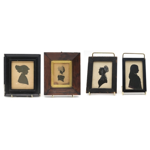 344 - A 19th century silhouette portrait miniature of a lady in profile, housed in a rosewood frame with g... 