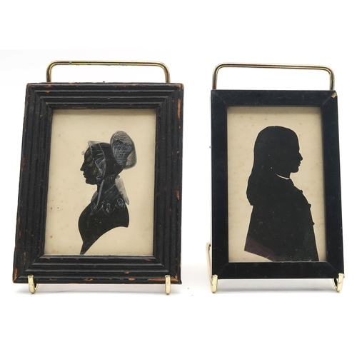 344 - A 19th century silhouette portrait miniature of a lady in profile, housed in a rosewood frame with g... 