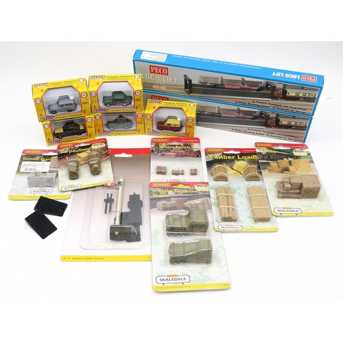 380 - A large quantity of 00-gauge railway accessories, to include a Hornby R8211 Rolling Road, assorted s... 