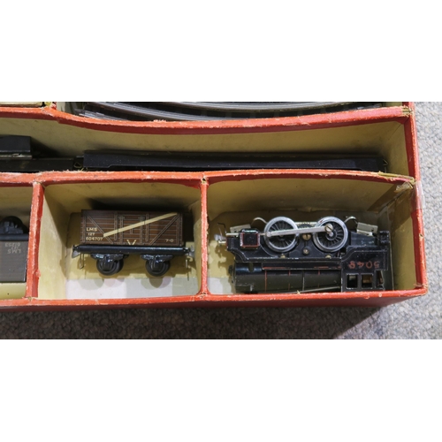 384 - A boxed Trix Twin Cadet Railway set, a further Trix Twin Railway set and a boxed Tri-ang Fort (3)