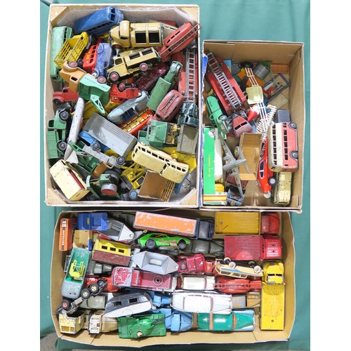 386 - A sizable assortment of playworn diecast model vehicles, largely by Dinky