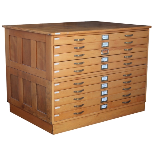 2112 - A 20TH CENTURY PITCH PINE PLAN CHEST with laminate top over ten narrow folio drawers on plinth base,... 