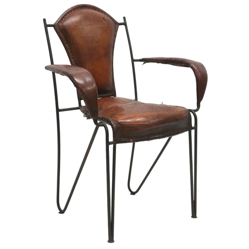 2115 - A MID 20TH CENTURY LEATHER & IRON ARMCHAIR AFTER JACQUES ADNET with open armrests made with stit... 