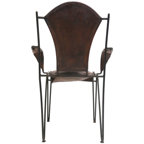 2115 - A MID 20TH CENTURY LEATHER & IRON ARMCHAIR AFTER JACQUES ADNET with open armrests made with stit... 