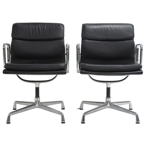 2116 - A PAIR OF VITRA EAMES EA 208 SOFT PAD CHAIRS with black soft leather upholstery and chrome open arms... 